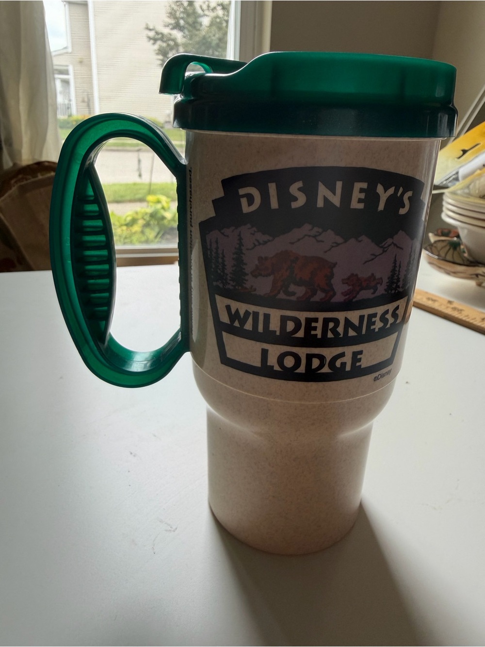 Disney Wilderness Lodge Travel Mug with Green Handle and Lid